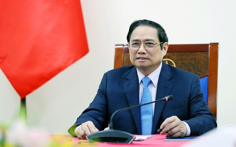 Thủ tướng Phạm Minh Chính điện đàm với Thủ tướng Italia Mario Draghi. (Ảnh: TTXVN)