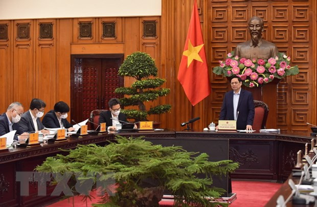 Thủ tướng Phạm Minh Chính phát biểu kết luận cuộc họp về việc nhập khẩu, sản xuất vaccine, thuốc điều trị Covid-19. (Ảnh: Dương Giang/TTXVN) Trình phê duyệt Chiến lược tổng thể phòng, chống dịch trước 30/11 -0