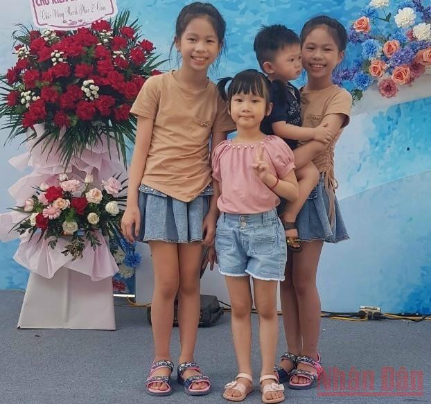 Chị em bé Minh Tâm-Minh Thư. (Ảnh: Gia đình cung cấp) Tết Thiếu nhi: Hy vọng thắp lên từ những lọn tóc buộc chun vàng -0
