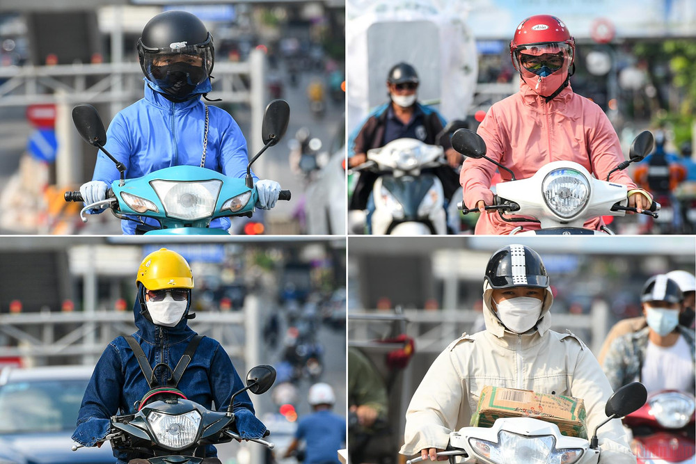 Trang phục kín mít như "Ninja" khi ra đường. Người dân Hà Nội chống chọi với nắng nóng gay gắt -0