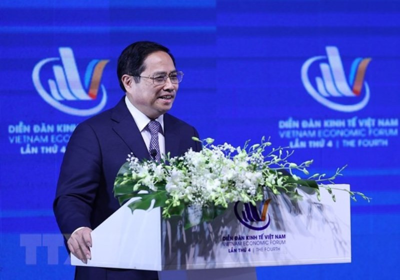 Thủ tướng Phạm Minh Chính phát biểu tại Diễn đàn Kinh tế Việt Nam lần thứ tư. (Ảnh: Dương Giang/TTXVN)
