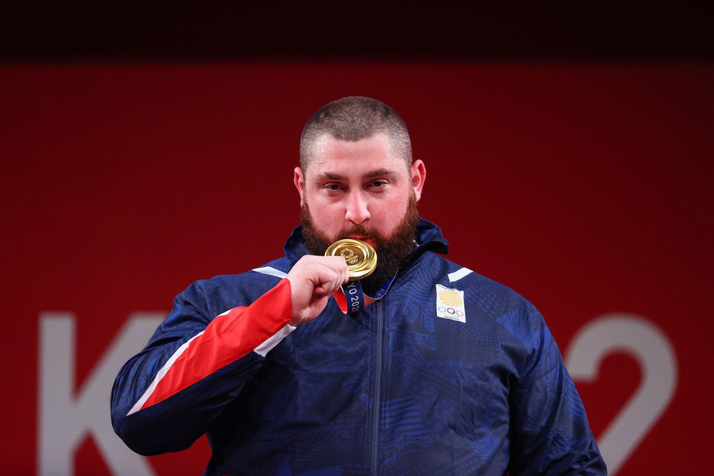 Lực sĩ Lasha Talakhadze giành huy chương vàng Olympic và phá ba kỷ lục thế giới hạng cân trên 109kg cử tạ nam. (Ảnh: Reuters) Những thống kê ấn tượng về Olympic Tokyo 2020 -0