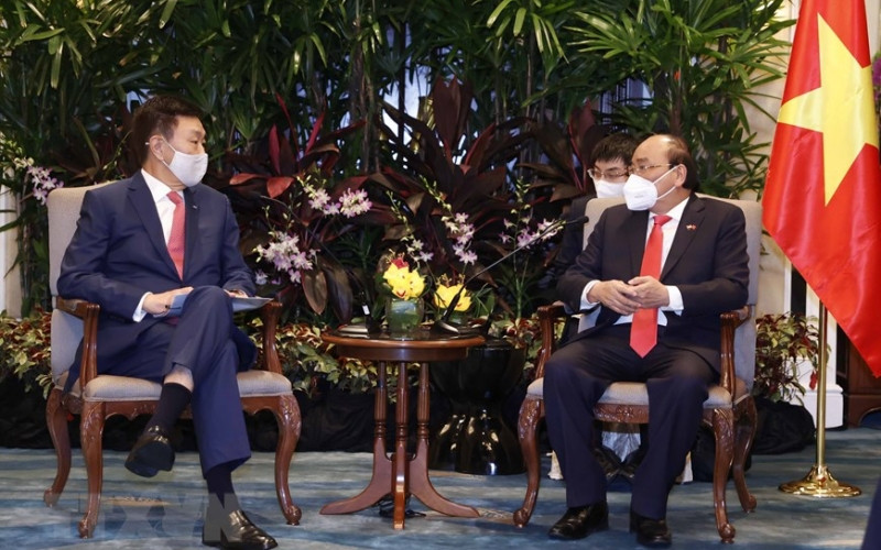 Chủ tịch nước Nguyễn Xuân Phúc tiếp ông Loh Chin Hua, Tổng Giám đốc Tập đoàn Keppel. (Ảnh: TTXVN) Việt Nam khuyến khích các doanh nghiệp Singapore đầu tư phát triển bền vững -0