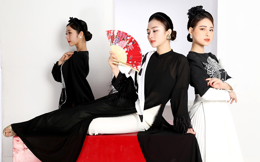 Ra mắt bộ sưu tập áo dài lấy cảm hứng từ quan họ ảnh 1 Ra mắt bộ áo dài lấy cảm hứng từ quan họ -0