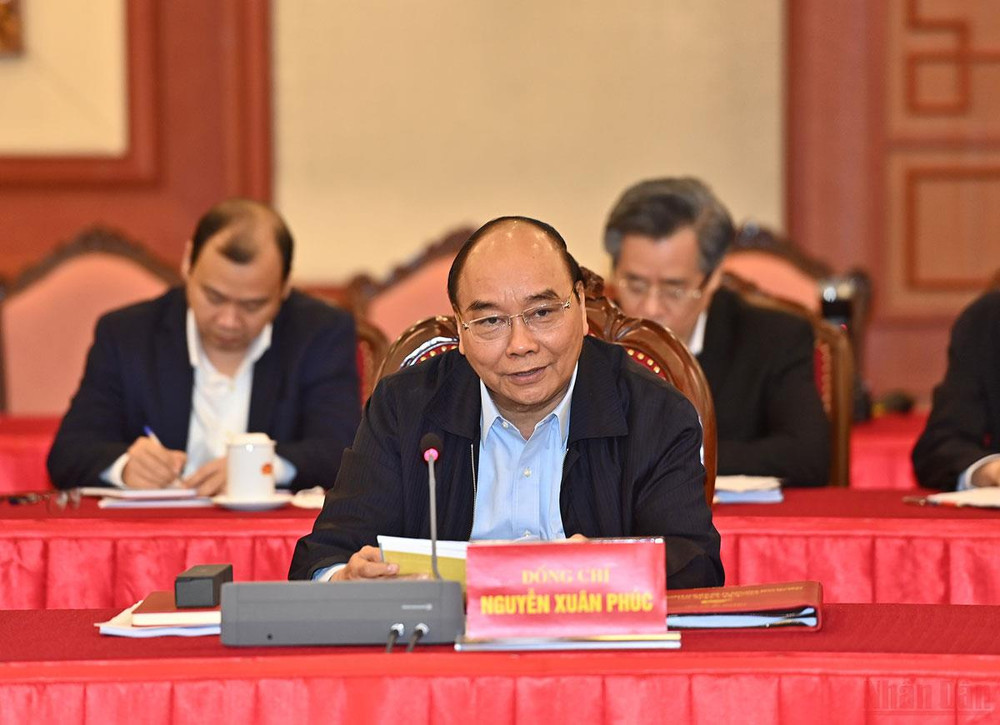Chủ tịch nước Nguyễn Xuân Phúc phát biểu ý kiến tại buổi họp. (Ảnh: ĐĂNG KHOA) Xây dựng Hà Nội thành trung tâm, động lực thúc đẩy, dẫn dắt phát triển vùng và cả nước -0