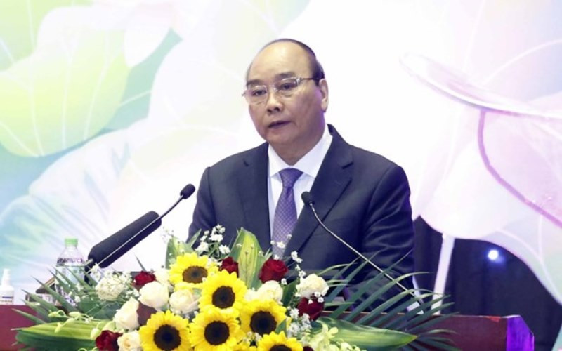 Chủ tịch nước Nguyễn Xuân Phúc phát biểu tại Đại hội đại biểu Luật sư toàn quốc lần thứ ba. (Ảnh: Thống Nhất/TTXVN) Nâng cao hình ảnh, uy tín nghề nghiệp, địa vị của luật sư -0