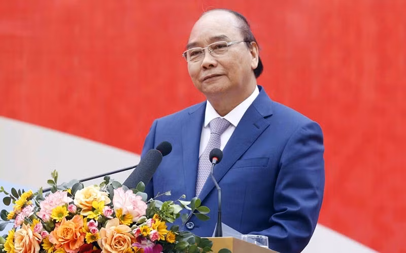 Chủ tịch nước Nguyễn Xuân Phúc phát biểu tại Lễ phát động thi đua năm 2022 của Tập đoàn Dệt may Việt Nam. (Ảnh: VOV)