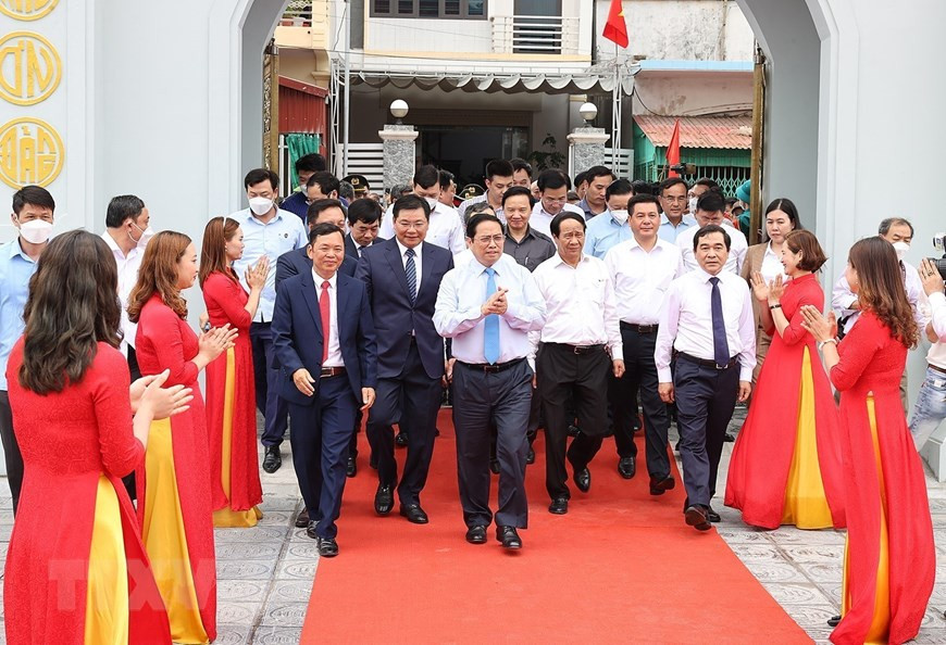 Thủ tướng Phạm Minh Chính đến dự Lễ kỷ niệm 60 năm Bác Hồ về thăm huyện Tiền Hải. (Ảnh: Dương Giang-TTXVN) Thủ tướng dự Lễ kỷ niệm 60 năm Bác Hồ về thăm huyện Tiền Hải -1