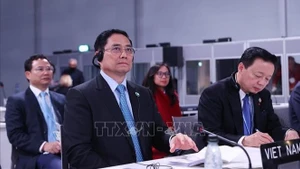 Thủ tướng Chính phủ Phạm Minh Chính dự Hội nghị Thượng đỉnh khí hậu được tổ chức trong khuôn khổ Hội nghị lần thứ 26 các Bên tham gia Công ước khung của Liên hợp quốc về Biến đổi khí hậu (COP26). (Ảnh: Dương Giang-TTXVN)