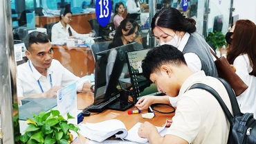 Các thủ tục hành chính được cải cách giúp hoạt động đầu tư, kinh doanh phát triển. Ảnh: BẮC SƠN