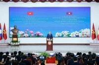 Tổng Bí thư Tô Lâm phát biểu chính sách tại Học viện Chính trị và Hành chính Quốc gia Lào, chiều 1/12/2025. (Ảnh: THỐNG NHẤT/TTXVN)