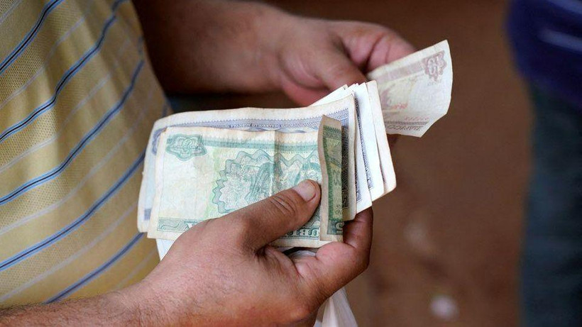 Hiện tại 25 peso đổi 1 USD. (Ảnh: Reuters)