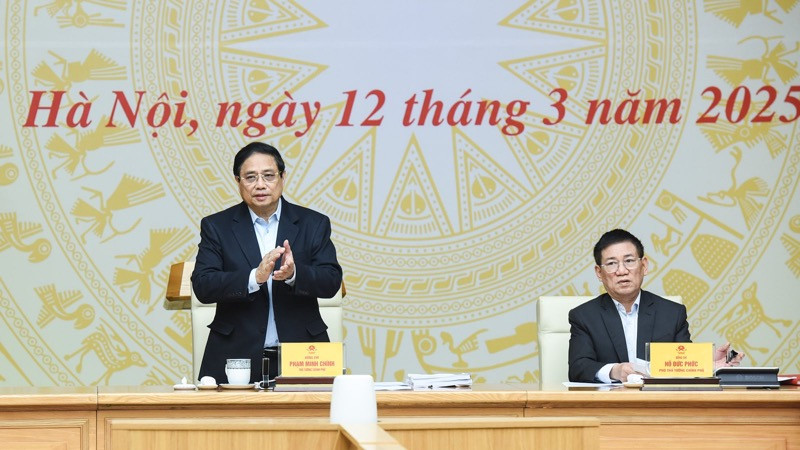 Thủ tướng Phạm Minh Chính chủ trì phiên họp lần thứ hai của Ban Chỉ đạo quốc gia về tài chính toàn diện. (Ảnh: TRẦN HẢI)