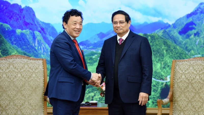 Thủ tướng Phạm Minh Chính và ông Khuất Đông Ngọc, Tổng Giám đốc Tổ chức Nông nghiệp và Lương thực Liên hợp quốc (FAO). (Ảnh: TRẦN HẢI)