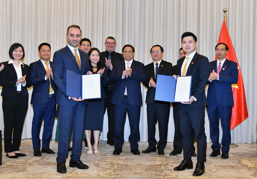 Thủ tướng Phạm Minh Chính chứng kiến lễ trao Biên bản ghi nhớ hợp tác giữa Tập đoàn T&T Group và Tập đoàn Đầu tư và tư vấn quốc tế JTA. (Ảnh: Thanh Giang)