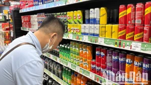 Cần cân nhắc kỹ lưỡng lộ trình khi áp thuế tiêu thụ đặc biệt đối với mặt hàng mới - nước giải khát có đường. (Ảnh minh họa: TRUNG HƯNG)