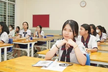 Các thí sinh tại điểm thi Trường trung học phổ thông Lê Quý Đôn, quận 3, Thành phố Hồ Chí Minh. (Ảnh: THẾ ANH)