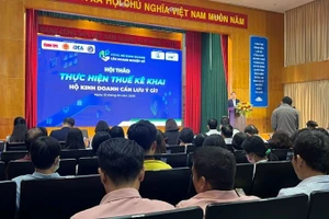 Quang cảnh hội thảo chủ đề “Thực hiện thuế kê khai: Hộ kinh doanh cần lưu ý gì?”