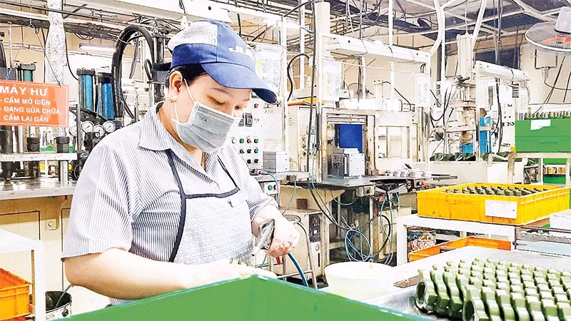 Hoạt động sản xuất tại Công ty TNHH Juki Việt Nam, Khu chế xuất Tân Thuận, Thành phố Hồ Chí Minh.