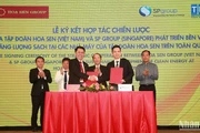 Đại diện hai đơn vị thực hiện ký kết hợp tác về năng lượng sạch.