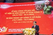 Lãnh đạo Công ty CP Bóng đèn phích nước Rạng Đông báo công tại buổi lễ.