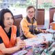 Trao hỗ trợ sinh kế cho người dân bị ảnh hưởng bởi bão số 3 và mưa lũ. (Ảnh CARE)