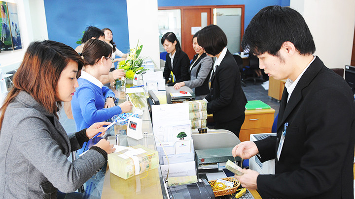 Việc điều hành chính sách tiền tệ hợp lý sẽ là yếu tố quan trọng để kiểm soát lạm phát. Ảnh: SONG ANH