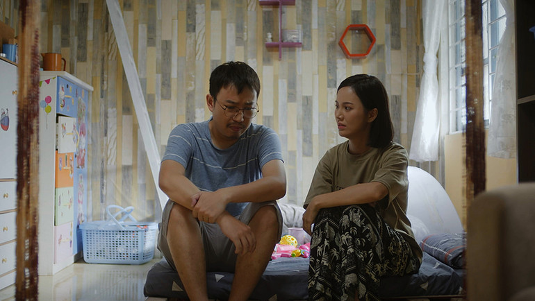 Quang Minh và Minh Thu trong phim.