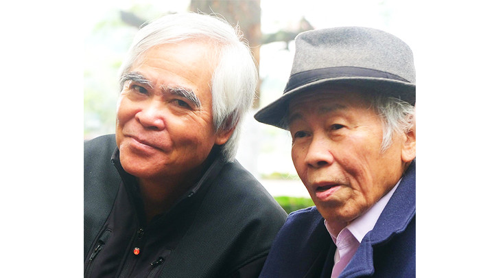 Nhiếp ảnh gia Nick Út (bên trái) và nhà báo Đỗ Quảng.