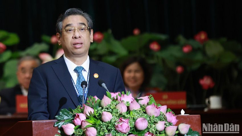 Đồng chí Nguyễn Phước Lộc, Phó Bí thư Thành ủy, Chủ tịch Ủy ban Mặt trận Tổ quốc Việt Nam Thành phố Hồ Chí Minh phát biểu khai mạc đại hội. (Ảnh: THẾ ANH)