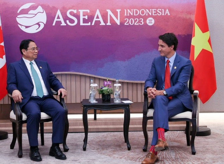 Thủ tướng Chính phủ Phạm Minh Chính và Thủ tướng Canada Justin Trudeau. (Ảnh: NHẬT BẮC)