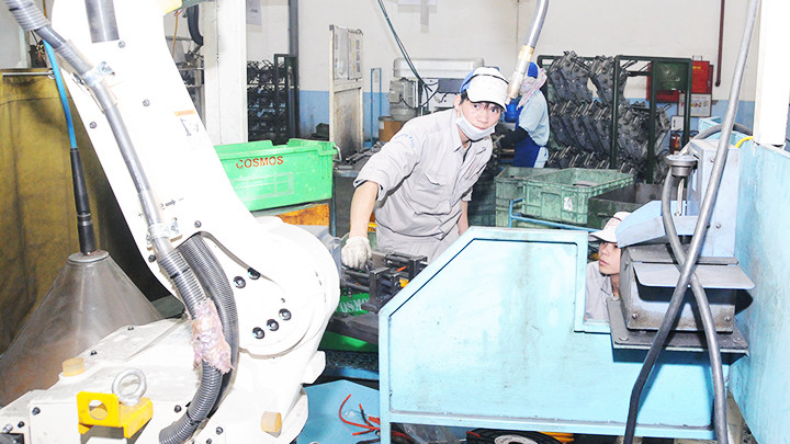 Các doanh nghiệp cần đẩy mạnh ứng dụng khoa học - công nghệ, giảm phát thải ra môi trường. Ảnh: BẮC SƠN