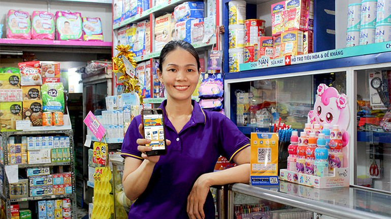 Hệ sinh thái tài chính số ECO là giải pháp số toàn diện hỗ trợ các điểm bán lẻ tạp hóa thông qua quản lý bán hàng và hàng tồn kho. Ảnh: Trần Minh