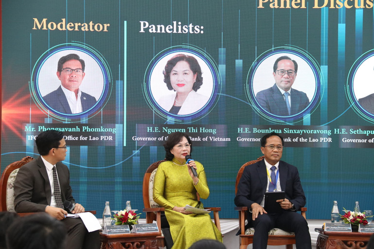 Thống đốc Ngân hàng Nhà nước Việt Nam Nguyễn Thị Hồng tham gia Hội thảo với vai trò diễn giả chính. Ảnh: Trịnh Dũng Thống đốc Ngân hàng Nhà nước Việt Nam Nguyễn Thị Hồng tham gia Hội thảo với vai trò diễn giả chính. Ảnh: Trịnh Dũng