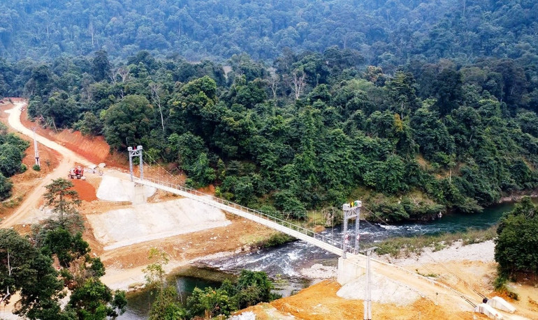 Đường vào bản Búng cơ bản đã thông xe. Ảnh: NH.LÂN Đường vào bản Búng cơ bản đã thông xe. Ảnh: NH.LÂN