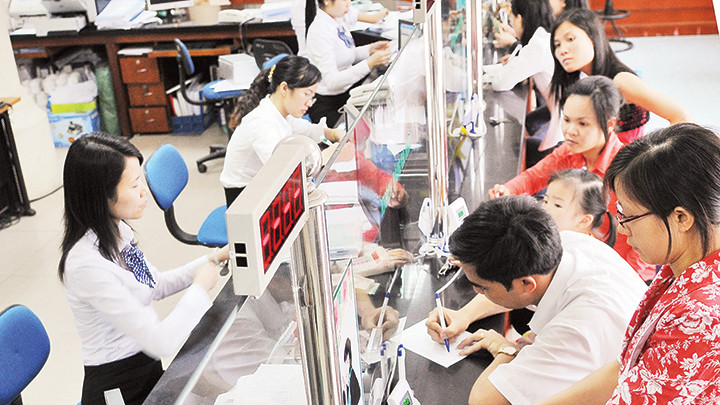 Mặt bằng lãi suất ngân hàng đang ở mức thấp. Ảnh: NGUYỄN HẢI