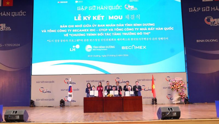 Ủy ban nhân dân tỉnh Bình Dương, Tổng công ty Becamex IDC và Tổng công ty Nhà đất Hàn Quốc (LH) ký kết hợp tác về “Chương trình đối tác tăng trưởng đô thị” tại hội nghị. Ủy ban nhân dân tỉnh Bình Dương, Tổng công ty Becamex IDC và Tổng công ty Nhà đất Hàn Quốc (LH) ký kết hợp tác về “Chương trình đối tác tăng trưởng đô thị” tại hội nghị.
