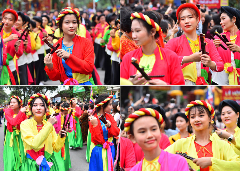 Các thiếu nữ của làng Láng Thượng duyên dáng trong điệu múa sênh tiền cổ truyền.