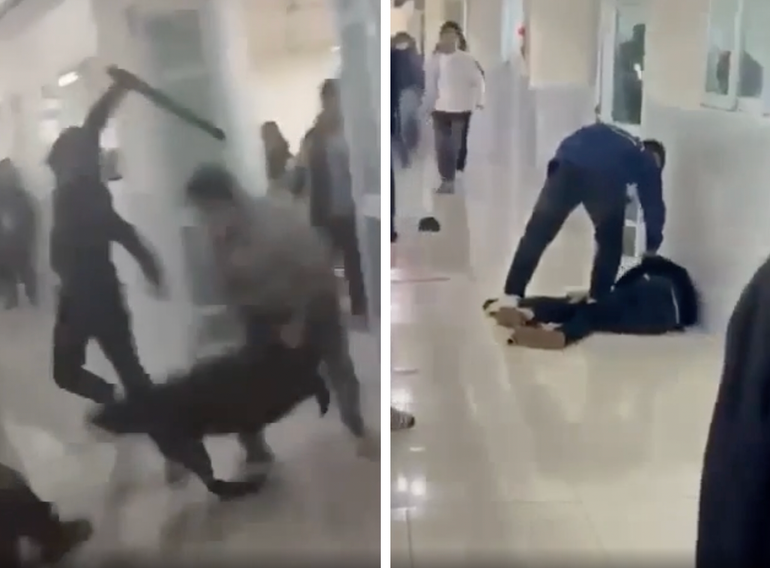 Nhóm sinh viên trường Đại học Tài Nguyên và Môi trường đánh bạn vì chuyện tình cảm. (Ảnh cắt từ clip trên mạng xã hội)