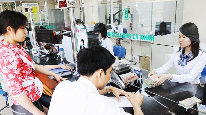 Chính sách tiền tệ cần đáp ứng nhu cầu tín dụng cho phục hồi sản xuất, kinh doanh. Ảnh: NGUYỆT ANH