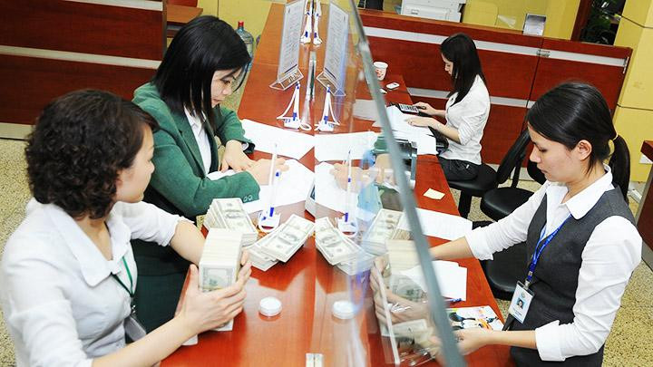 Việt Nam có đủ tiềm lực để bình ổn thị trường và tỷ giá nhờ nguồn dự trữ ngoại tệ lớn. Ảnh: NGUYỆT ANH