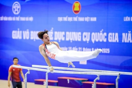 Đinh Phương Thành giữ phong độ cao tại Giải vô địch Thể dục dụng cụ quốc gia 2025. (Ảnh MINH DÂN) 