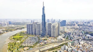 Một góc Thành phố Hồ Chí Minh nhìn từ trên cao. (Ảnh HOÀNG TRIỀU)