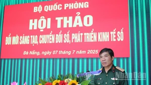 Thiếu tướng Đào Minh Đạo - Phó Cục trưởng Cục Tài chính, Bộ Quốc phòng phát biểu tại khai mạc hội thảo. (Ảnh: ĐÌNH TĂNG)