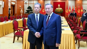 Tổng Bí thư Tô Lâm và Ủy viên trưởng Nhân đại toàn quốc Trung Quốc Triệu Lạc Tế. 
