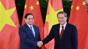 Thủ tướng Phạm Minh Chính với Thủ tướng Trung Quốc Lý Cường. 