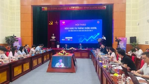 Toàn cảnh hội thảo chuyên đề “Nâng hạng thị trường chứng khoán, mở rộng kênh huy động vốn cho nền kinh tế”. (Ảnh: MINH PHƯƠNG)