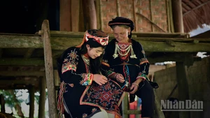 Phụ nữ Dao quần trắng ở xã Phúc An, huyện Yên Bình, tỉnh Yên Bái. (Ảnh: VŨ LINH)