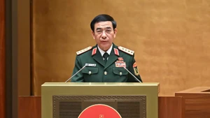Đại tướng Phan Văn Giang, Ủy viên Bộ Chính trị, Bộ trưởng Quốc phòng trình bày báo cáo tiếp thu, giải trình, chỉnh lý dự thảo Luật. (Ảnh: DUY LINH)