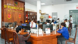 Giao dịch khách hàng tại Quỹ tín dụng nhân dân Tân Phúc (tỉnh Hưng Yên)